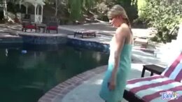 Blonde teen masturbating in outdoor pool
